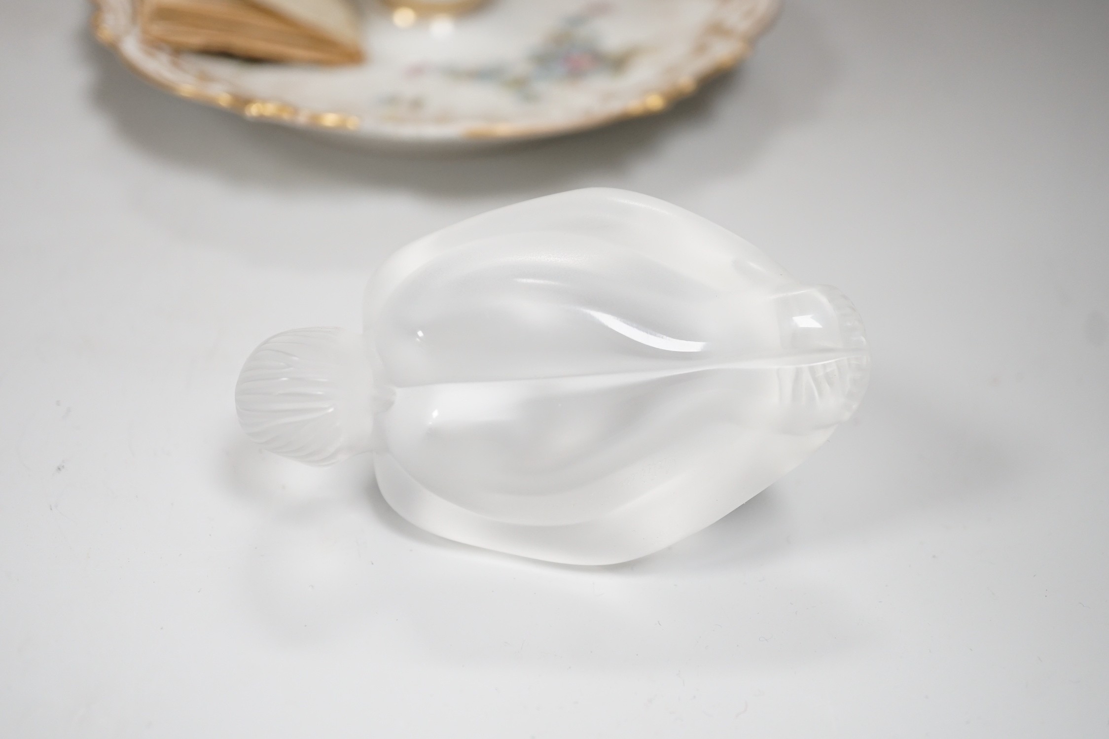 Continental porcelain figures, a Lalique figure of a crouched figure, etc.